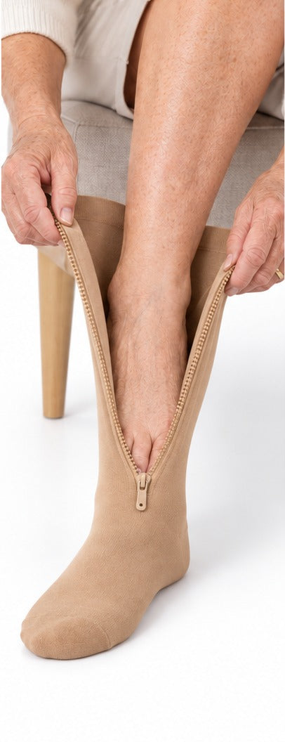 Step 2: slipping the foot into the open sock while seated